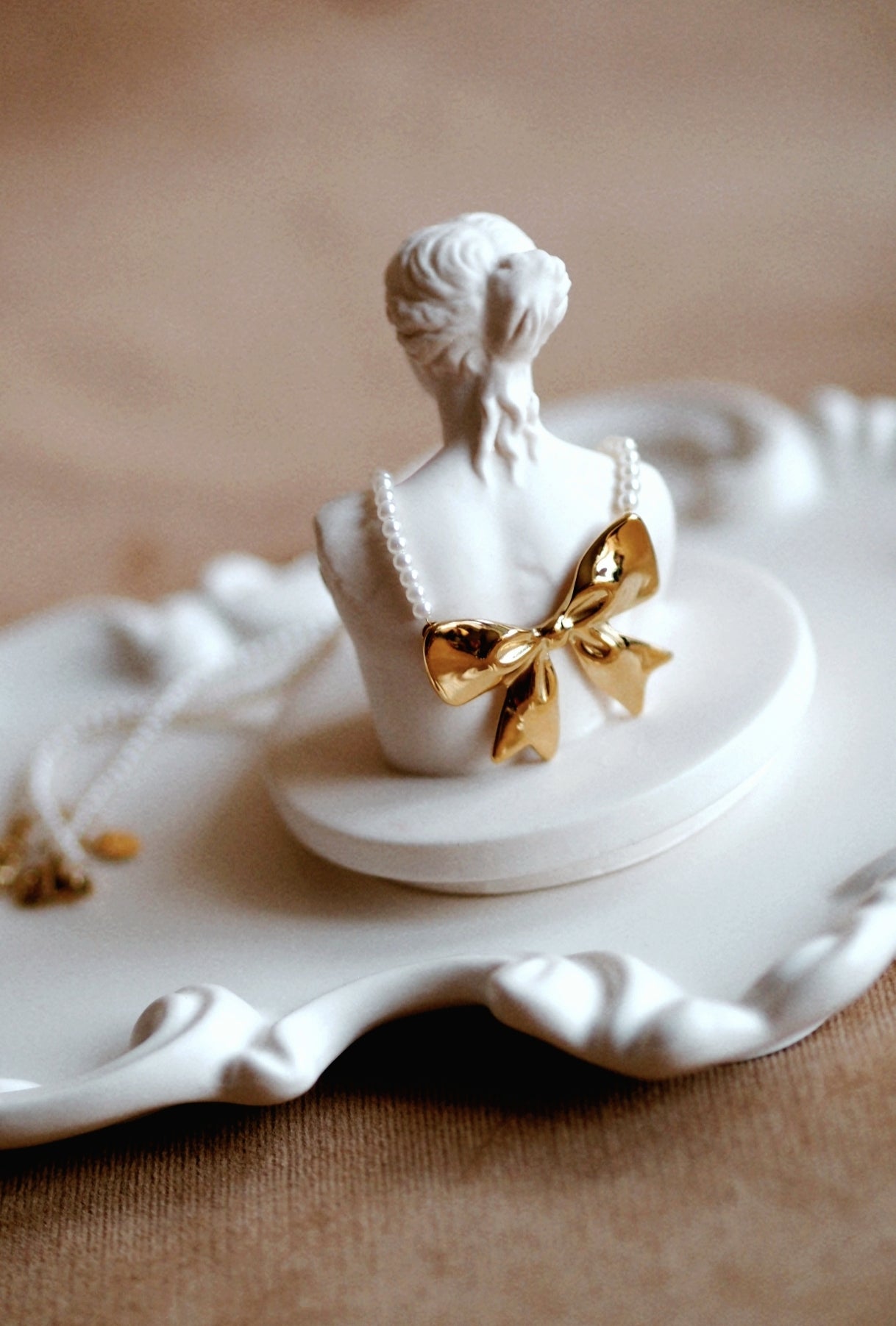 Pearl Bow Necklace In Silver