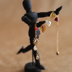 Charming Bracelet with Pendants in Gold