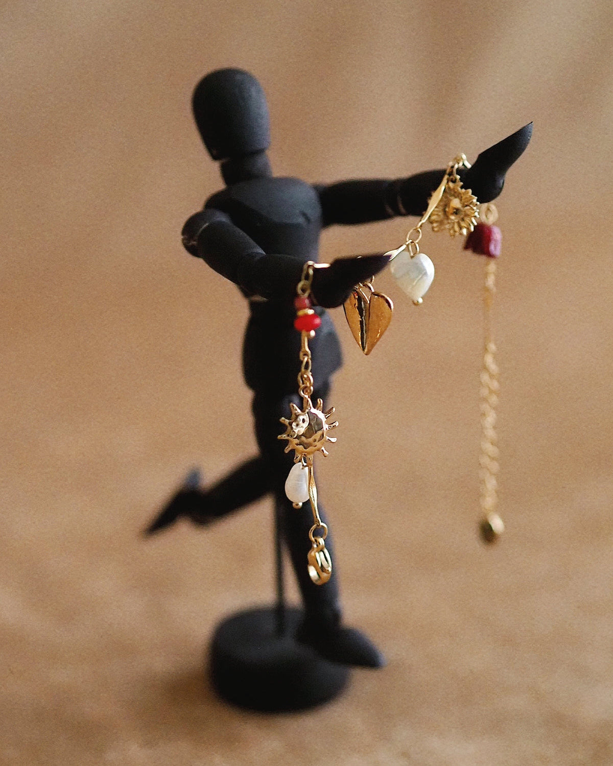 Charming Bracelet with Pendants in Gold