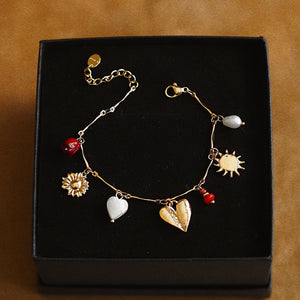 Charming Bracelet with Pendants in Gold