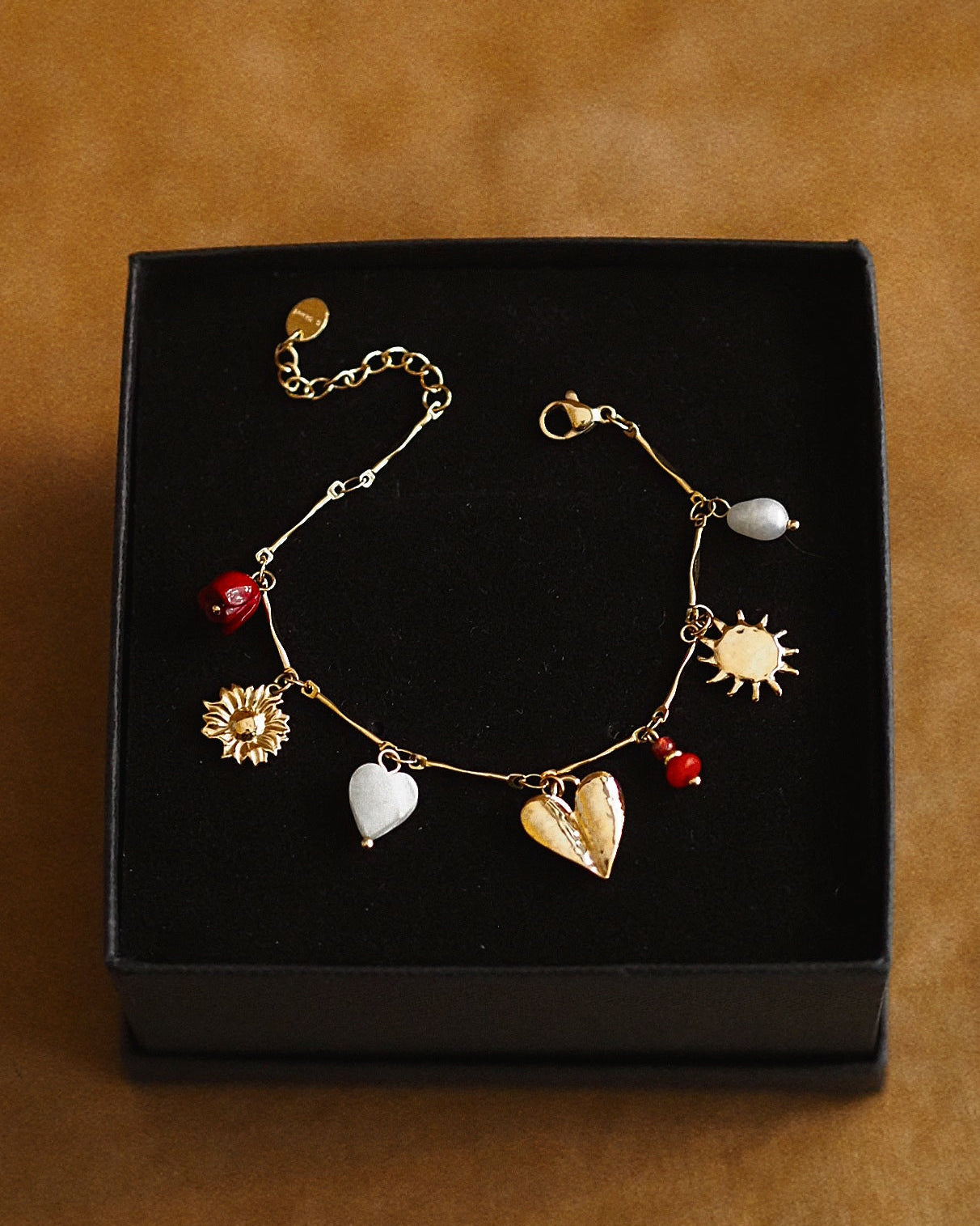 Charming Bracelet with Pendants in Gold