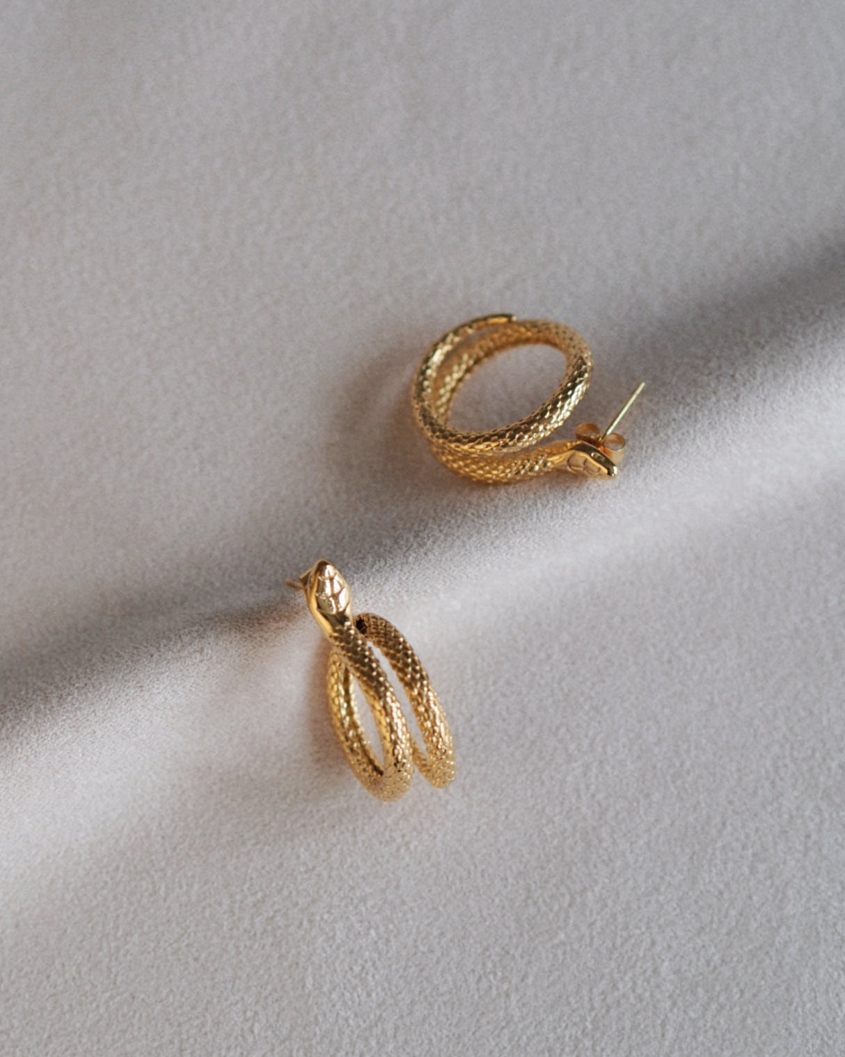 Elegant Snake Studs in Gold