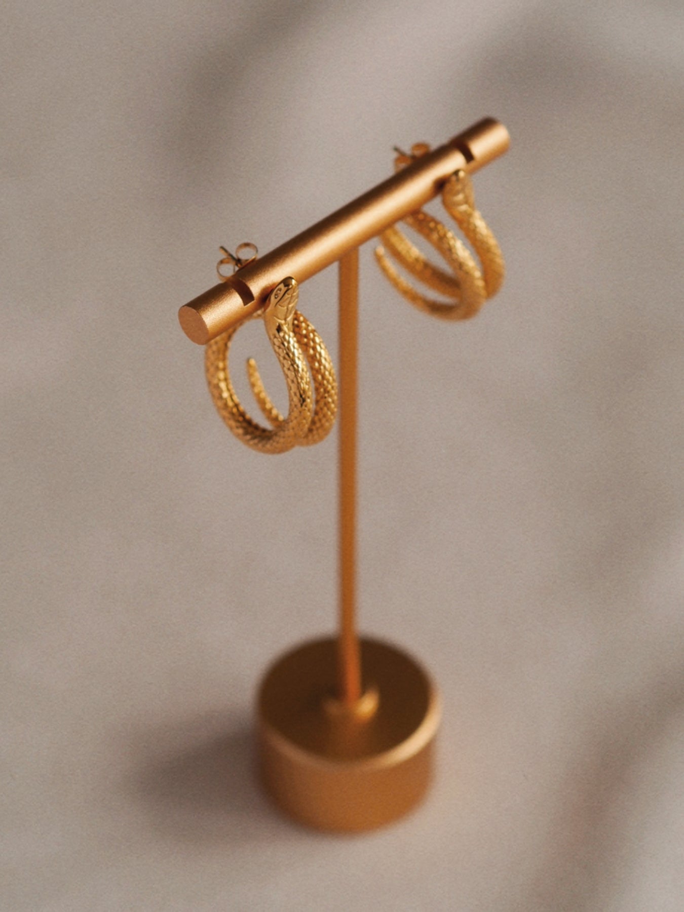 Elegant Snake Studs in Gold