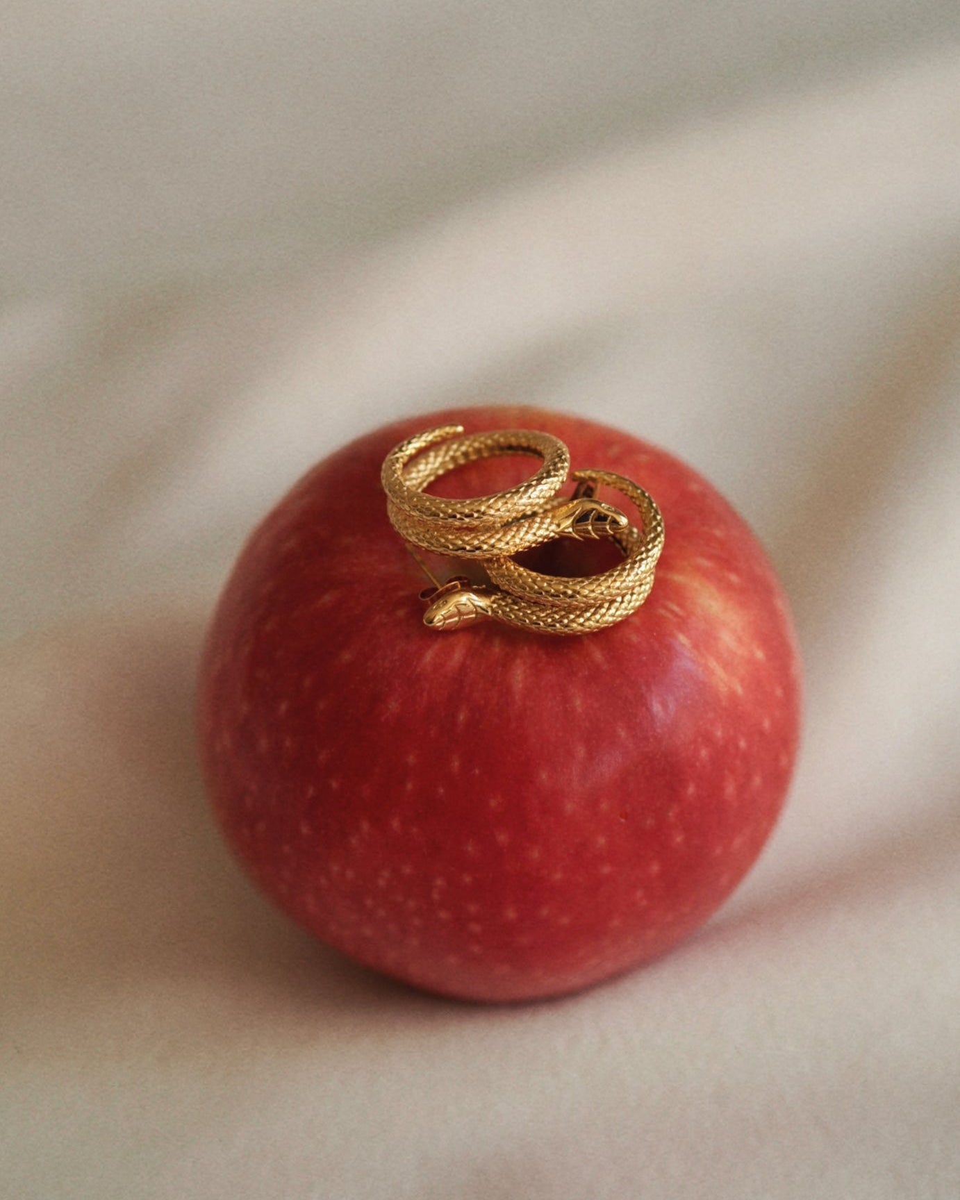 Elegant Snake Studs in Gold