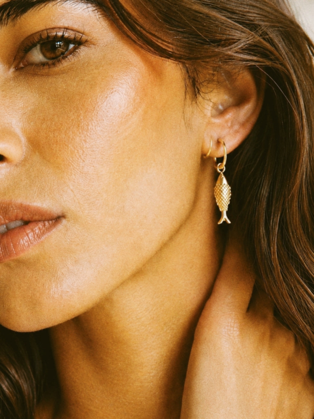 Elegant Fish Earrings in Gold