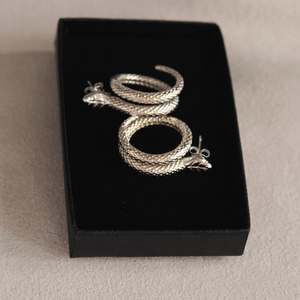 Elegant Snake Studs in Silver