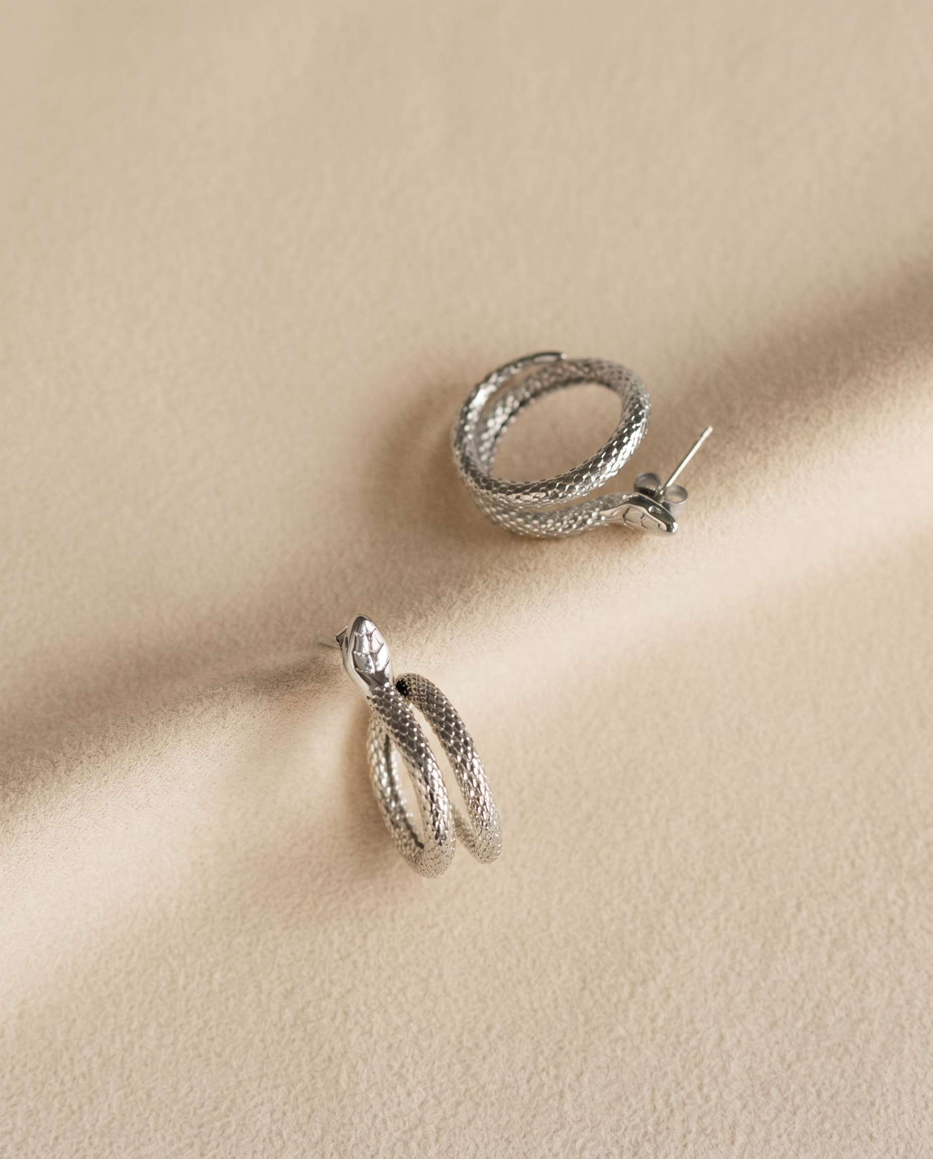 Elegant Snake Studs in Silver